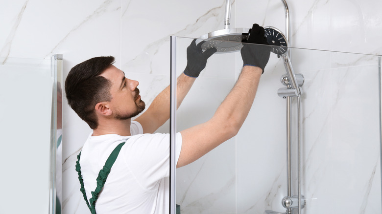 Person installing shower