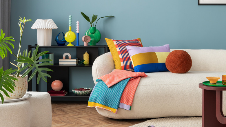 Bouclé couch in brightly decorated room