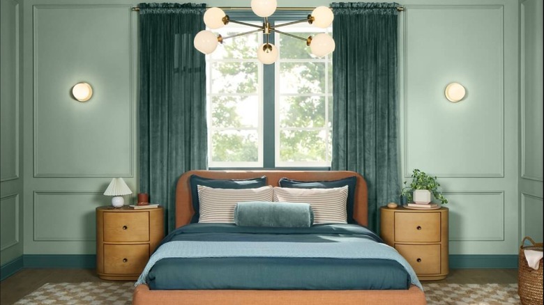 green bedroom walls with molding