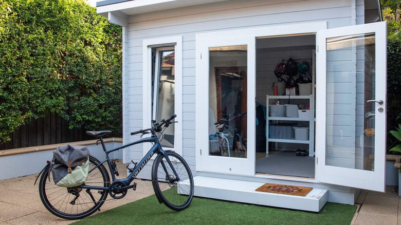 Small insulated shed with bike