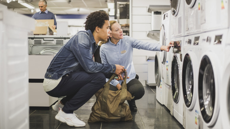 Person shopping at an appliance store