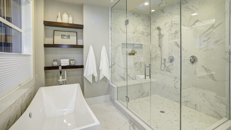 Marble shower with glass doors