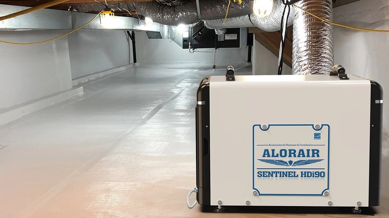 Bucketless dehumidifier in a encapsulated crawl space