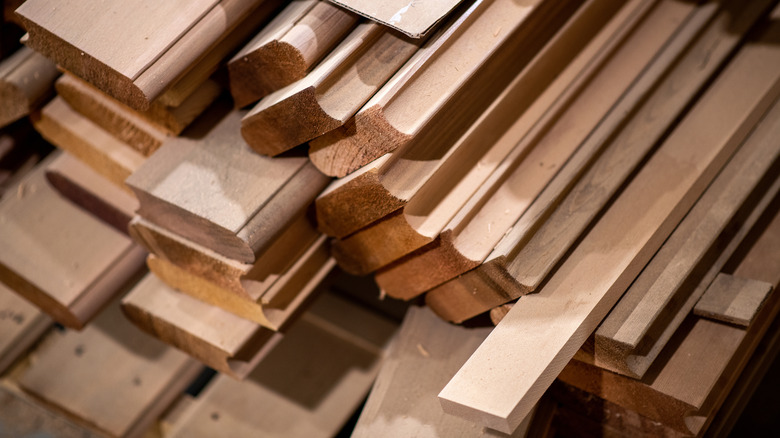 A stack of cut cedar planks