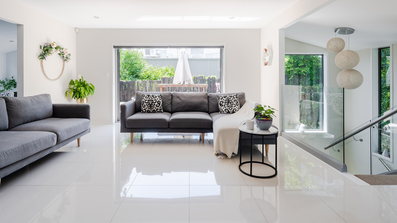 Two couches in all-white interior