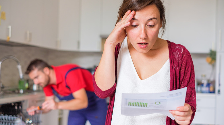 Woman inspecting home