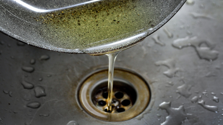 Pouring oil down drain