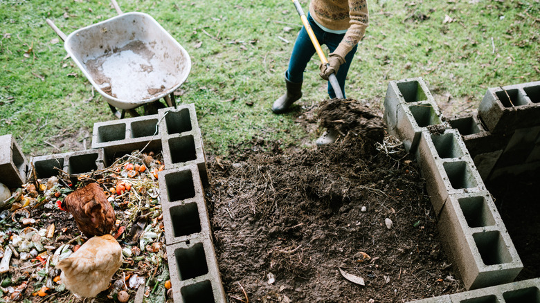 Person shoveling compost