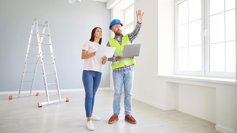 Homeowner talking to contractor