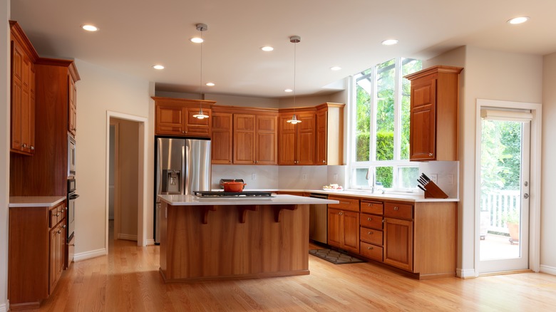 large kitchen with wooden cabinets