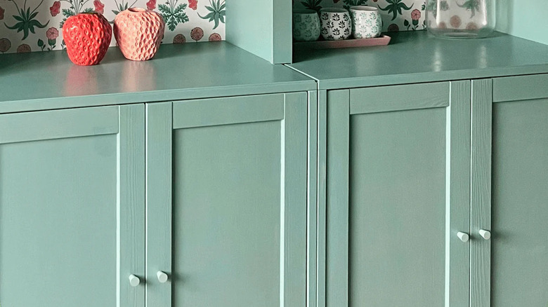 mint cabinets with matching knobs