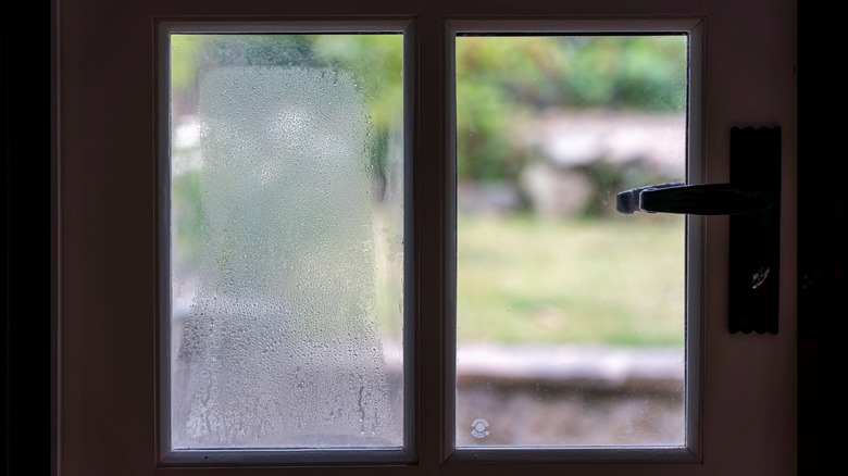 Glass panel with moisture