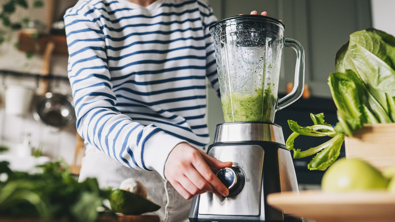 A person using a blender