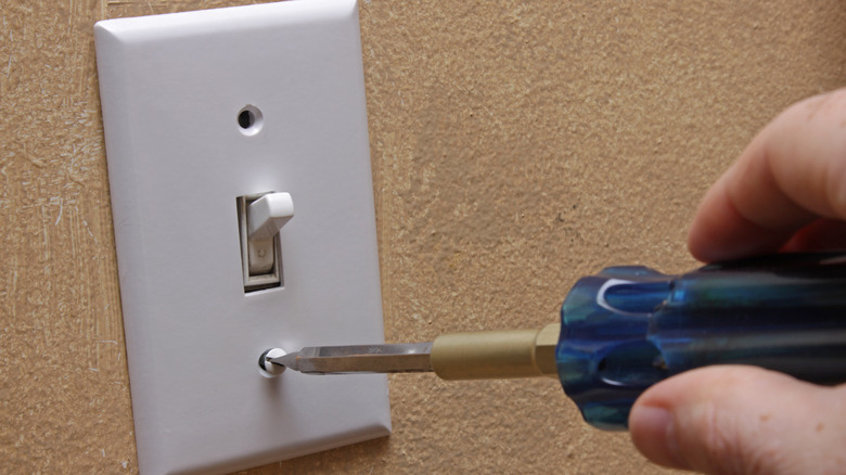 Removing light switch cover