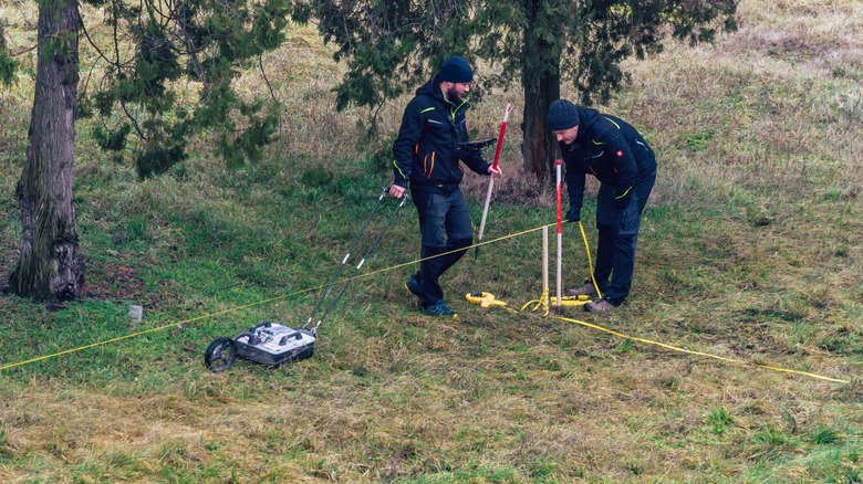 People using a ground penetrating radar