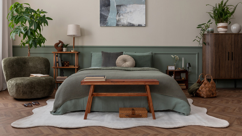 Chic modern bedroom with a half-painted paneled wall