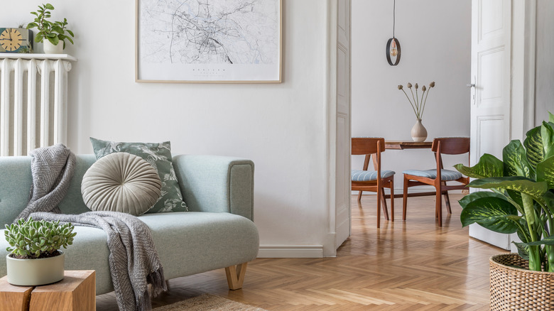 grey living spaces with wood floors