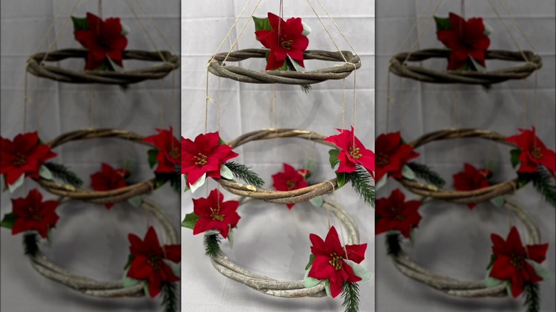 Suspended poinsettia display with branches