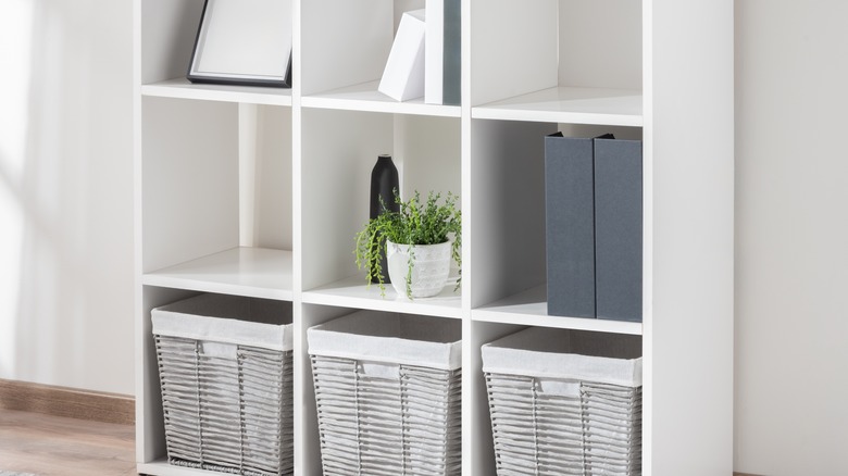 A home is decorated with white storage cubes