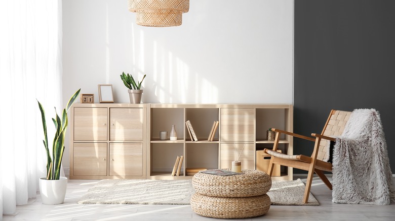 Home storage cubes are finished with wood and decorated with neutral décor