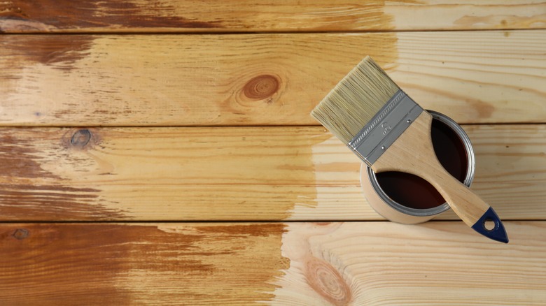 wood varnish with paintbrush