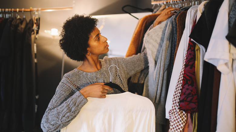 woman looking at closet