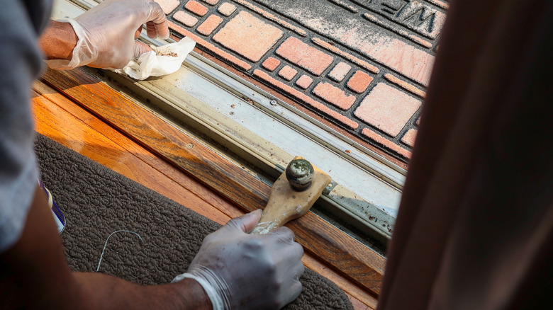 cleaning dirty tracks on patio doors