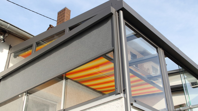 Modern sunroom with exterior shade