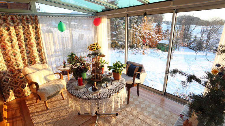 Sunroom with rug and curtains