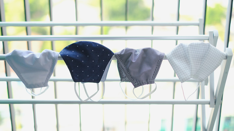 mask drying on clothes rack