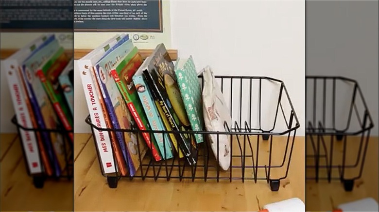 books shelved in dish rack