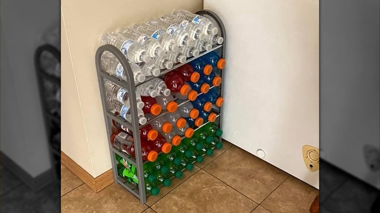 Bottled drinks on metal shelving unit