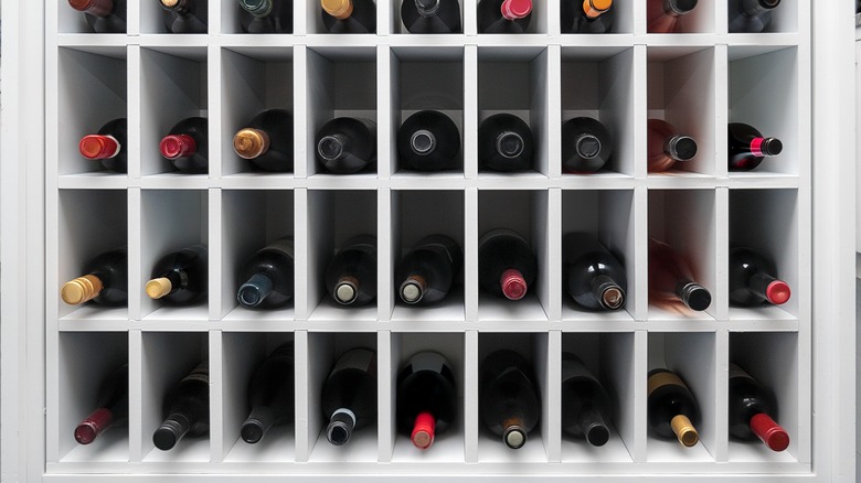 Wine bottles in storage rack