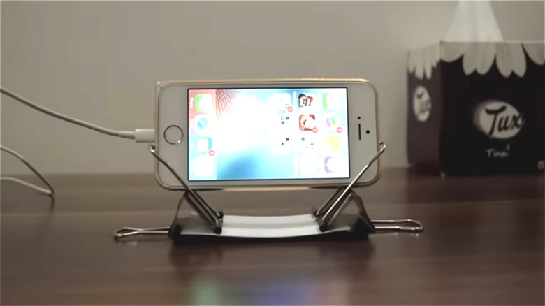 phone on binder clip stand