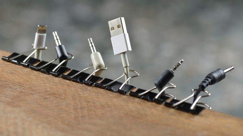 electrical cords threaded through binder clips