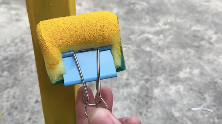 binder clip attached to sponge 