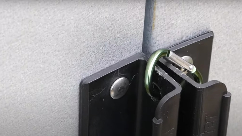 cabinet locked with carabiner