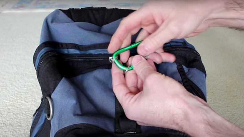 securing zippers with carabiners