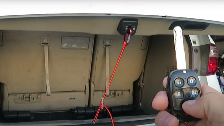 secure trunk with carabiner and rope