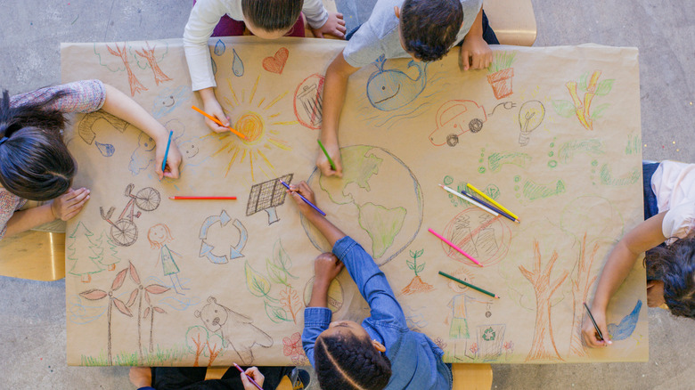 children drawing together