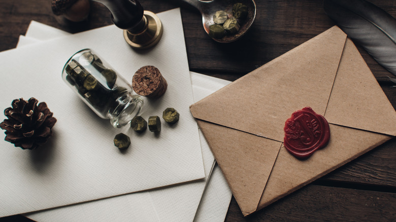 brown envelope with wax seal