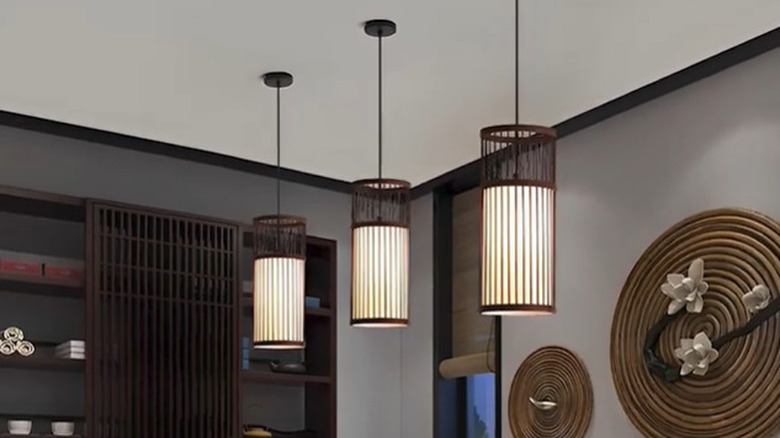 room with bamboo pendant light