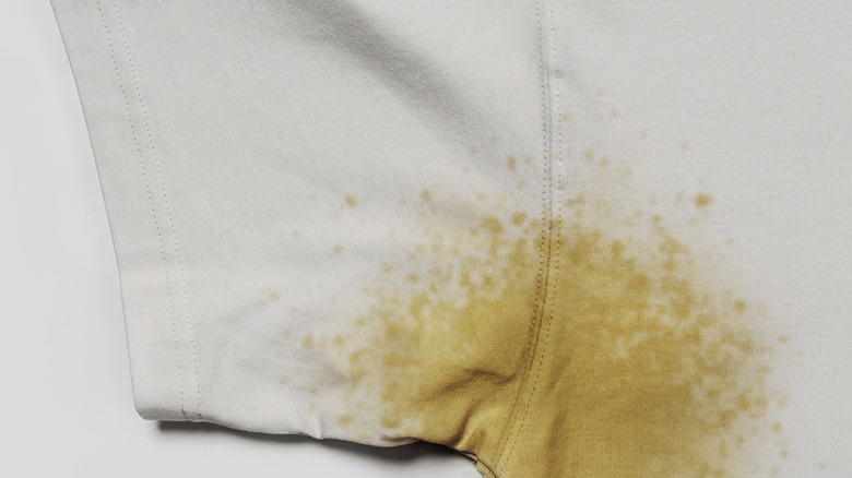 Sweat stains on white t-shirt