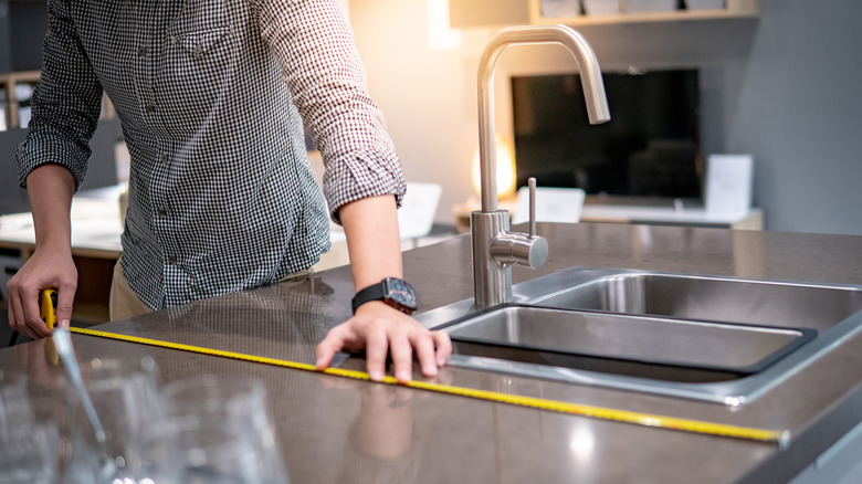 measuring a countertop for repair