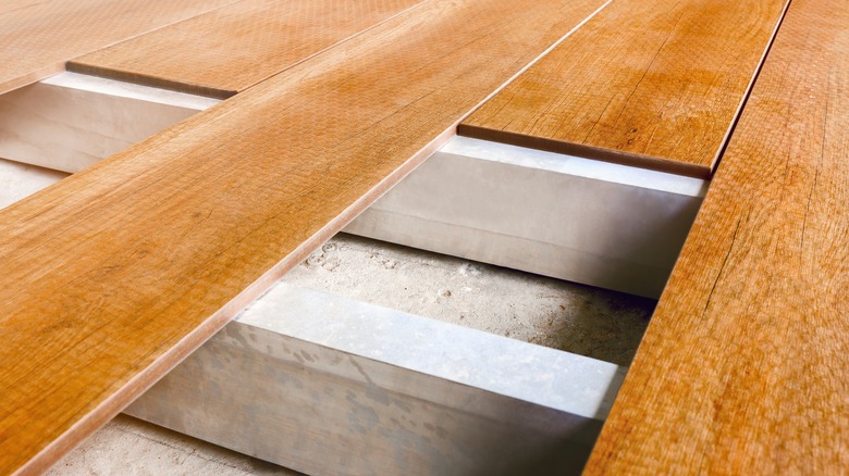 floating subfloor under wood planks