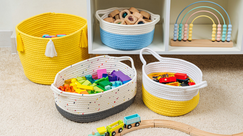 Several colored baskets filled with blocks and toys.