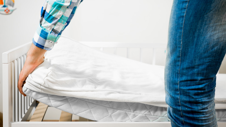 Person turning mattress