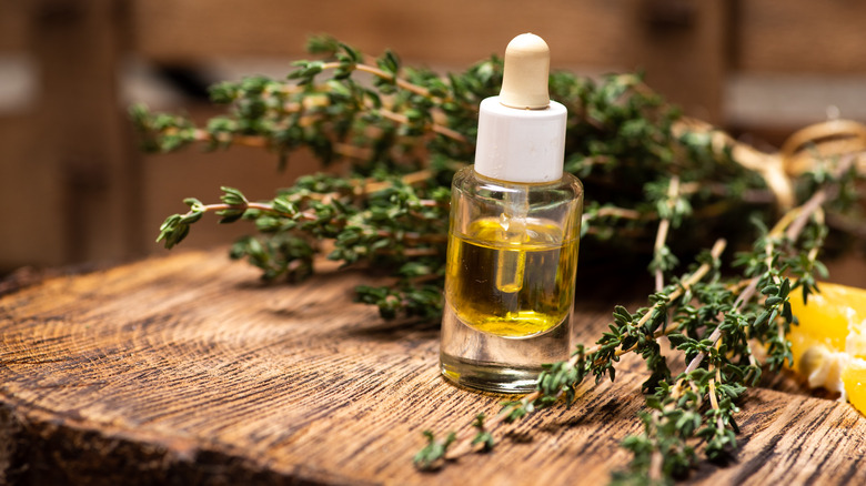 Rosemary essential oil and herbs