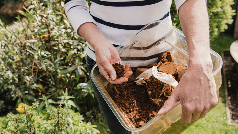 Woman with coffee grounds