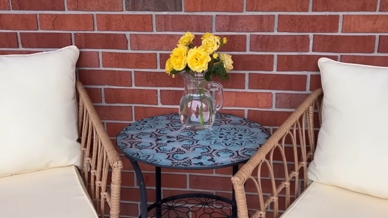 Patio table with yellow roses